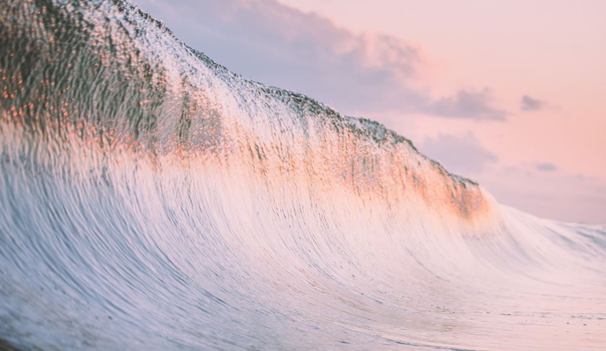 Untitled -  Love me some walls of water. there\'s so much force about to be unloaded before me. So much energy that\'s wound up inside that slab of ocean about to pour and burst, yet it\'s so delicate and beautiful. The reflection on the face looks like a seismograph reading or some sort of musical waveform. I wonder if anyone would be able to translate it into sound and see what that would sound like... Photo: <a href=\"https://www.clarkography.com/\" target=_blank>Matt Clark</a>