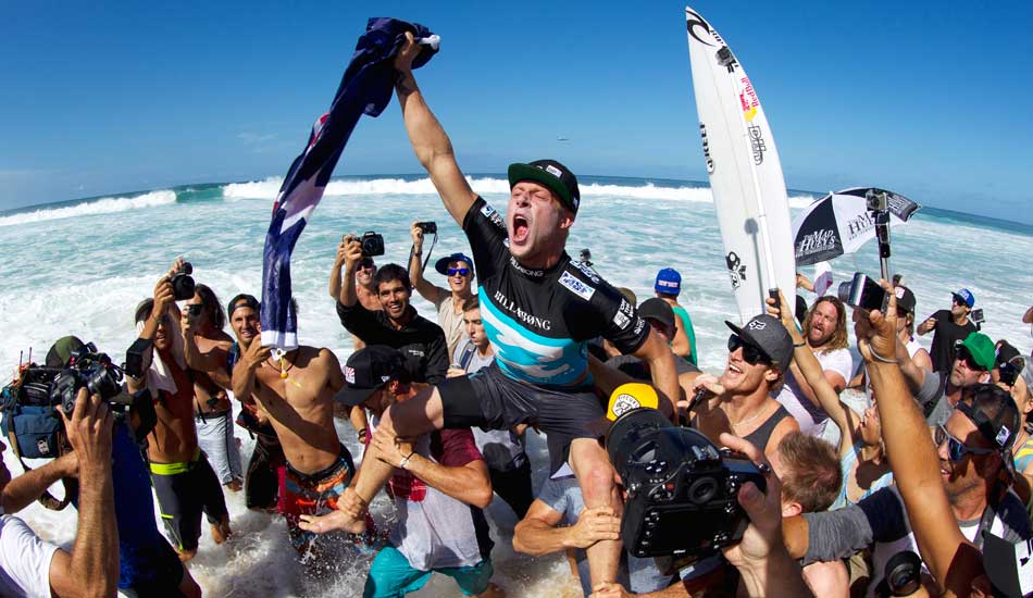 Mick Fanning moments after hearing he got the 9.7 that solidified his status as world champ. Photo: <a href=\"https://mattdunbar.com.au\">Matt Dunbar</a>