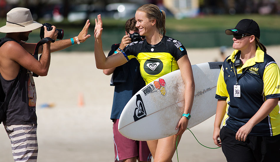 Bianca Buitendag gets a high five after taking down Tyler Wright. Photo: <a href=\"https://mattdunbar.com.au\">Matt Dunbar</a>