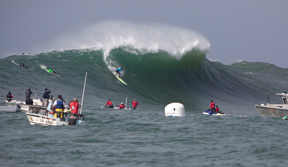 Kohl Christensen.  You can see Shawn Dollar with his vest inflated paddling over the shoulder. Photo: <a href=\"https://withinwaves.com/\" target=_blank>Nick Allen</a>