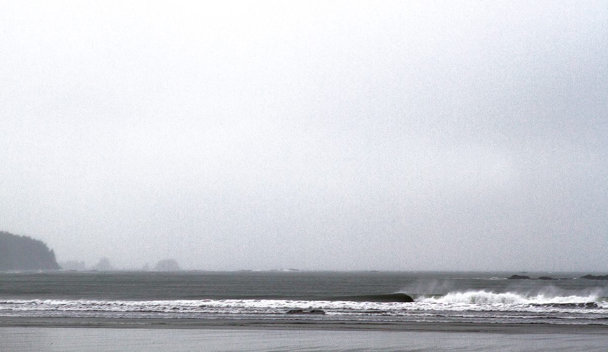 Rusty Long, Timmy Reyes and I were on a mission deep in no man\'s land and were enduring some of the most testing conditions ever. It was raining like crazy and super cold. We were up early one morning and it was raining, naturally, but I said screw it, I\'m going to go look at the ocean. This was the first frame I shot. Needless to say, the boys got psyched and we were out the door. Photo: <a href=\"https://markmcinnis.com/\" target=_blank>Mark McInnis</a>