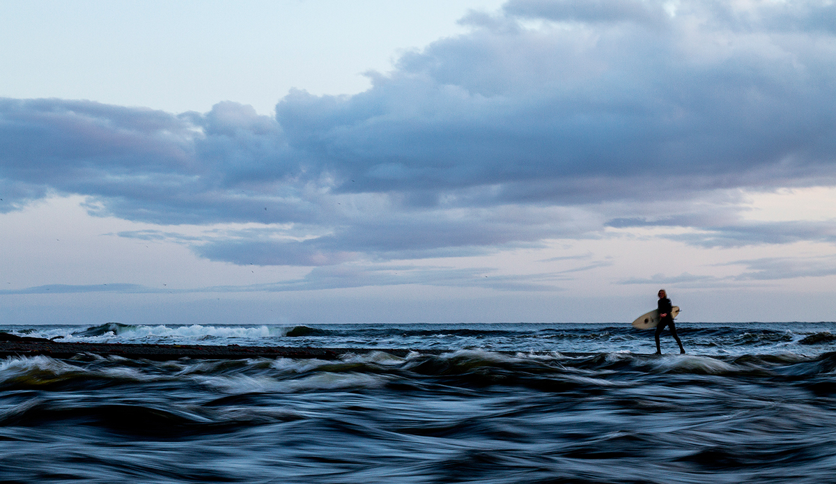 My good buddy Raph Bruhwiler has been running <a href=\"https://www.tatchuadventures.com/Site_3/Tatchu_Adventures.html\">Tatchu Adventures</a> for the last year or so off of a remote island in Canada. This is Raph\'s amazing cook at the lodge, Alex Morrow, strolling home after an evening session down the beach. Anybody want a once in a lifetime trip? Follow that link and get psyched! Photo: <a href=\"https://markmcinnis.com/\" target=_blank>Mark McInnis</a>