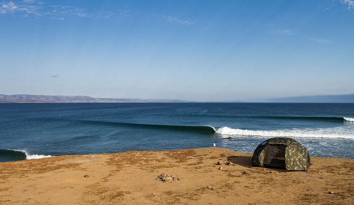 This might sound kind of weird, but this image actually makes me extremely sad. I had been chasing this wave for ten years, and never scored it like this. We rolled up and the four of us surfed this wave by ourselves for three days straight. While we were there, the fishing village on the inside started building a jetty so they could launch their vessels closer to the village instead of driving them the 1/8 mile to the old boat launch. By the time we left, the backwash from the hardly even built jetty was already messing up the inside of the wave. Breaks my heart. Photo: <a href=\"https://markmcinnis.com/\" target=_blank>Mark McInnis</a>