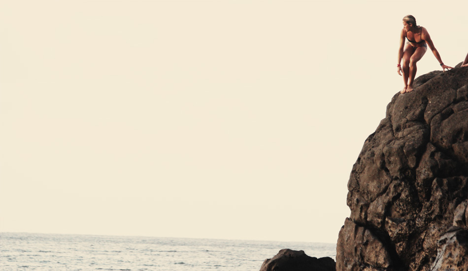 Courtney Conlogue making the jump, Waimea Bay. Photo: Megan Villa