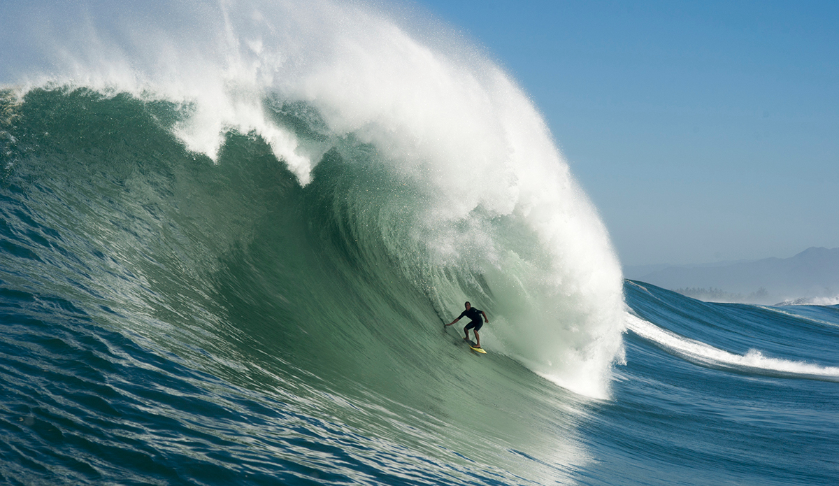 Chad Compton on one of the bombs of May 3. My driver Justin saw this 
wave and ran over to it to get the shot, but in the process of doing that 
we threw a wake up the face, which made the lip flare, bucking Chad 
off his feet. It\'s kind of a double-edged sword for Chad. On one hand we 
ruined a perfect A-frame, but on the other we got a crazy photo. Photo: <a href=\"https://instagram.com/nicolalugo/\">@Nicola Lugo</a>