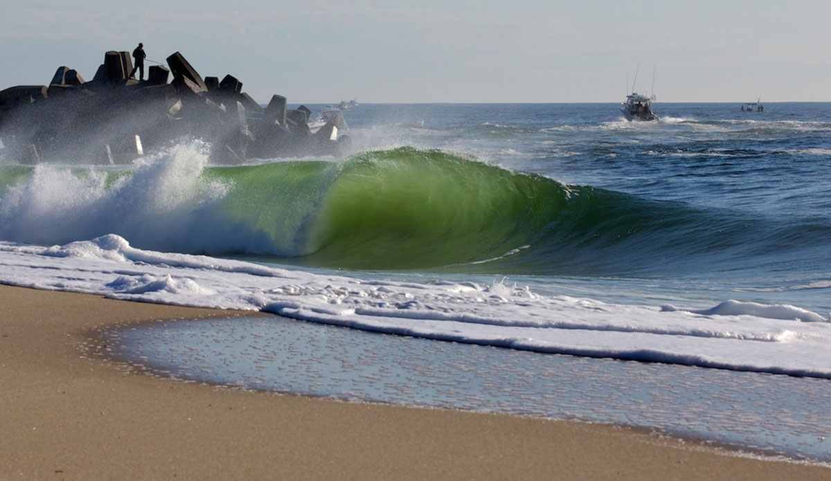 Another one from that magical morning in NJ.  This end section of the wave is what I would draw on my notebook as a kid, perfect form, rounded edge and minor striations in the face.  The lighting and water color also help tremendously with the appeal of this photo.  Water clarity and color are both things I have come to appreciate more and more the longer I shoot and as we all know the water is often pretty murky around these parts. Photo: <a href=\"https://www.mgvphotography.com/\">Michael Vericker</a>