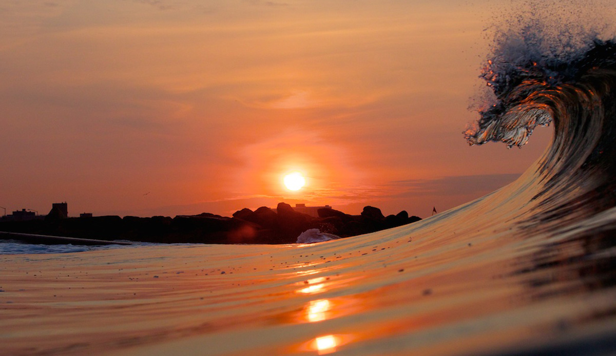 I call this one \"The Dragon.\" I decided to head out one early morning in July when the waves weren\'t big but there was very little wind which makes for some nice water features in the waves when they start breaking. The sun rising just over the jetty also adds a nice touch to this one. Photo: <a href=\"https://www.mgvphotography.com/\">Michael Vericker</a>