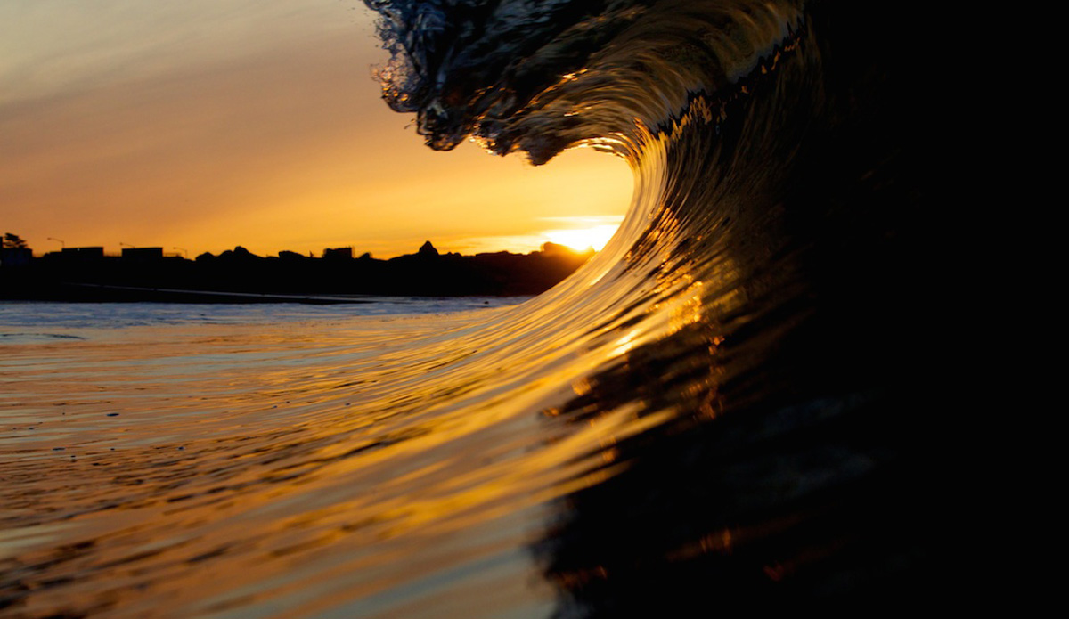 Another nice little barrel shot with the early morning glow of the sunrise.  I really love how the angle of light from sunrises and sunsets in New York light up the barrel.  It\'s an amazing little phenomena that I find myself chasing every chance I get. Photo: <a href=\"https://www.mgvphotography.com/\">Michael Vericker</a>