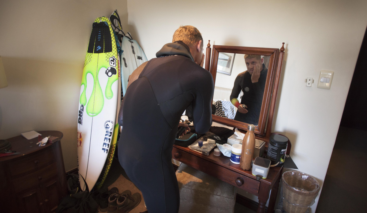 \"That’s at J-Bay last year. I’m always trying to get inside to shoot people’s environments. That’s just him in his room at J-Bay right at the point, preparing to surf. I love it because it’s super intimate.\" Photo: <a href=\"https://t-sherms.com/\" target=\"_blank\">Steve Sherman</a>