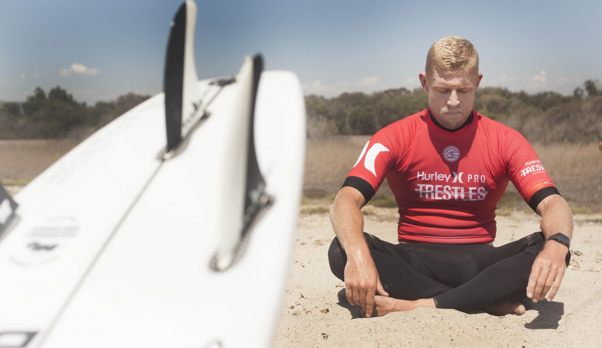 \"Usually before his heats, he goes off by himself and has this thing. Right before a heat, I don\'t say a word to Mick. I don\'t even look him in the face, because he just likes to be in his own headspace. He always sits down, crosses his legs, gets in his mindspace. I think he almost thinks about his brothers he lost and Andy. He\'ll look up to the sky and give props up to somewhere with people he\'s lost in his life. It\'s a very intense thing, and he\'s always by himself. It\'s one of those moments I\'ve shot a million times, but it\'s never old for me to shoot. I\'m always moved by it.\" Photo: <a href=\"https://t-sherms.com/\" target=\"_blank\">Steve Sherman</a>