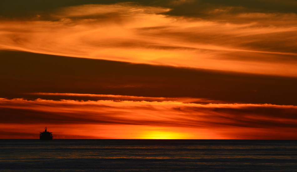 Fire in the sky at El Porto. Photo: <a href=\"https://www.mikearonesty.com\">Mike Aronesty</a>