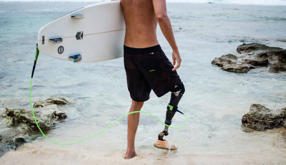 I followed Mike out across the sharp reef at Rocky Rights on what I thought of as a sizable day, and it was during that walk out it became even more apparent to me what an epic human this man is.  Photo: <a href=\"https://danlemaitrephoto.com\" target=\"_blank\">Dan Lemaitre</a>