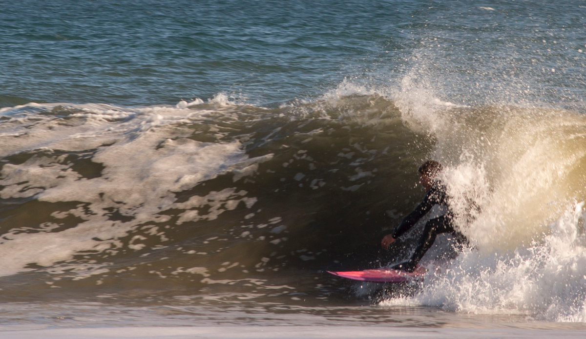  Yadin Nichol tucks in from the harsh winter sun. Photo: <a href=\"https://www.milesjackler.com\"MilesJackler.com</a>