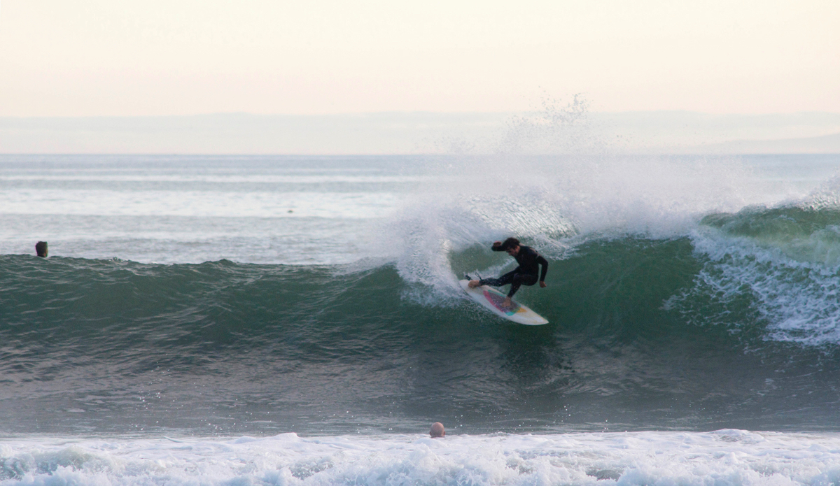 Simon Murdoch releasing some tension and fins on his Lovelace hand-shaped sled. Photo: <a href=\"https://www.milesjackler.com\"MilesJackler.com</a>