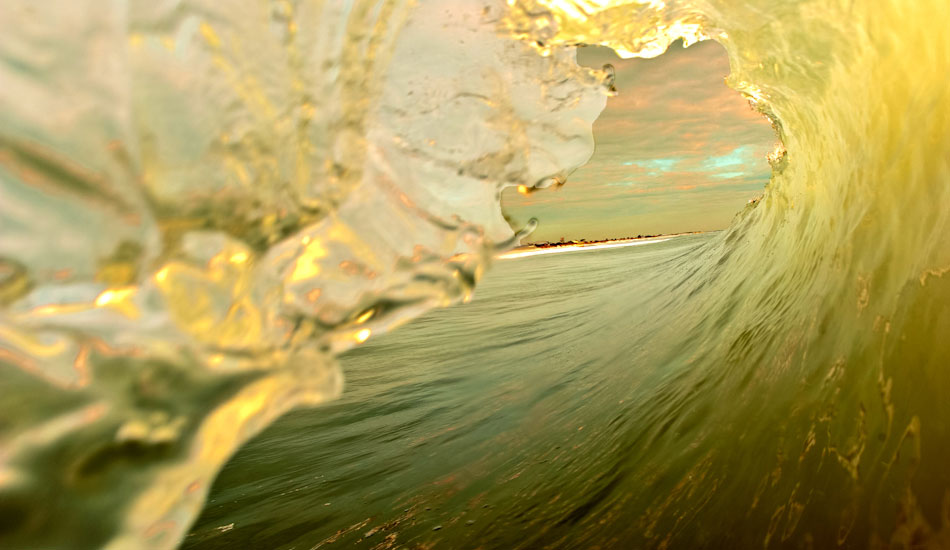 This image symbolizes the reason I wanted to take my camera into the ocean to start with. The view of looking out of the tube for sure, but also, all the colors, moods, and moments experienced only by surfers. This view is what unites surfers worldwide into this lifestyle of the endless pursuit of waves. Photo: <a href=\"https://www.marksainwilson.com/?splash=1\" target=_blank>Mark Wilson</a>