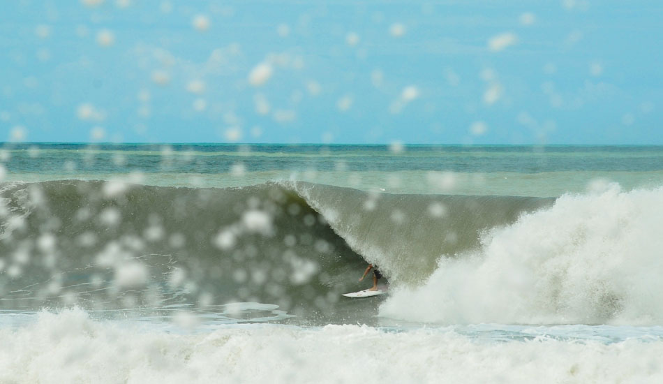 This was shot in Stuart, Florida during Hurricane Irene. I like this image because it shows what can happen when all the elements come together in Florida to produce some sizeable waves and tubes. The white spots are the result of whitewater hitting the rock ledge I’m shooting from and blasting 20+ feet in the air. Photo: <a href=\"https://www.marksainwilson.com/?splash=1\" target=_blank>Mark Wilson</a>