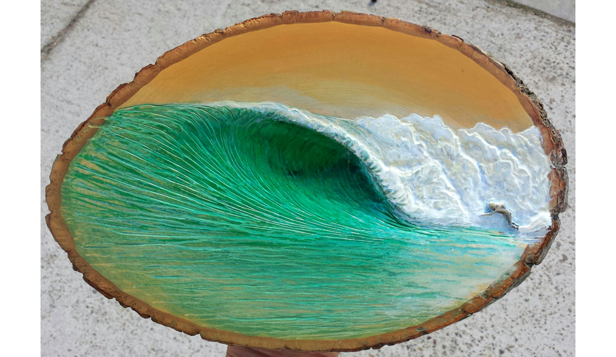 “Rounding the Corner.” This was my first time experimenting with round wood slabs. It’s also one of the few pieces where I decided to include a surfer. Image: Nathan Ledyard