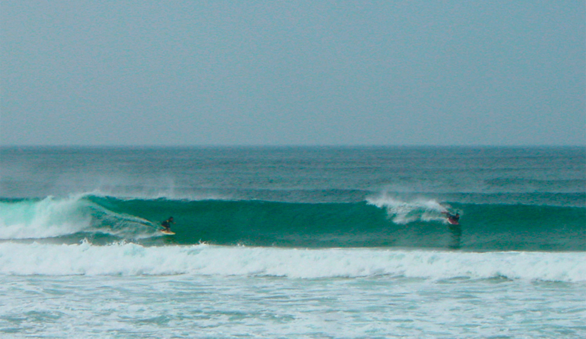 A couple of locals sharing a wave. They left within about 30 minutes and we had it to ourselves.  It was an amazing setup with the next two photos from the same location. Photo: Troy Roennfeldt