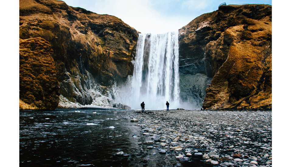 A journey into solitude. Skogafoss Falls, Iceland. Photo:<a href=\"https://www.colinnearman.com\">Colin Nearman</a>