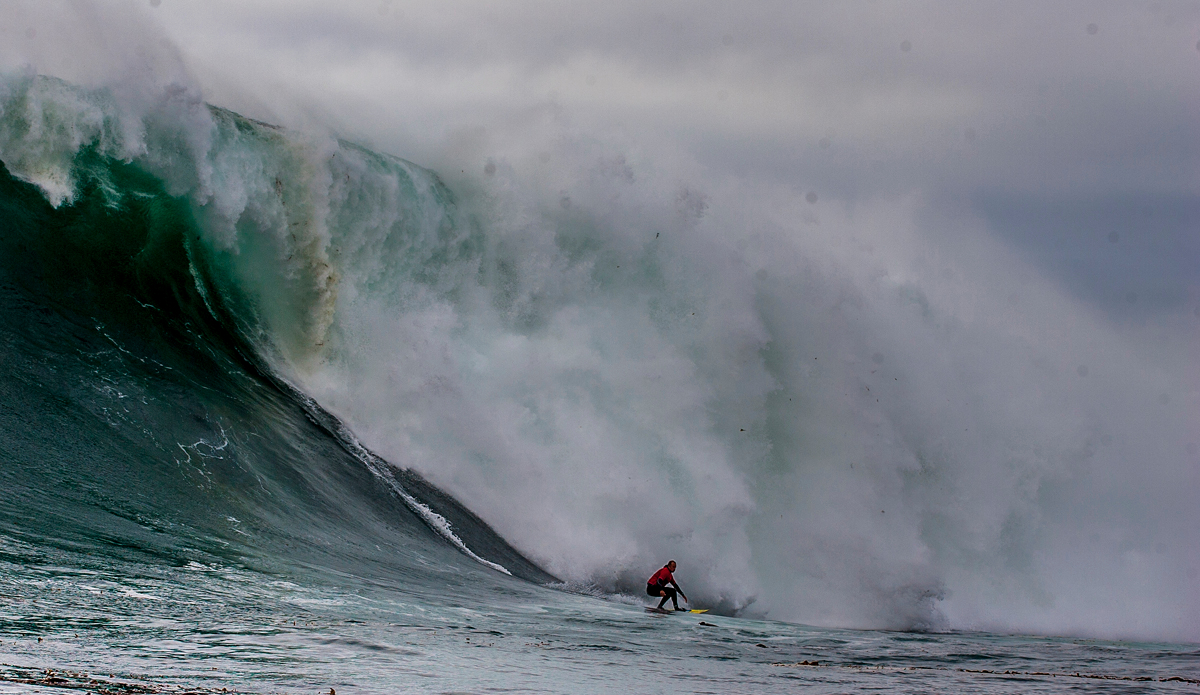 Anthony Ruffo at Ghost Tree. This was one of the biggest west swells in decades with buoy readings that were so big that they almost didn’t make sense. I think it was like 28 feet at 23 seconds. Either way, it was massive, and it was scary as f#$k. I was out there shooting at Ghost Tree. Some of the sets blackened the horizon and capped out in the middle of the ocean. Anthony Ruffo got this huge one, and I\'m pretty sure he was done after this wave. Photo: <a href=\"https://davenelson-photography.com\">DaveNelson-photography.com</a>