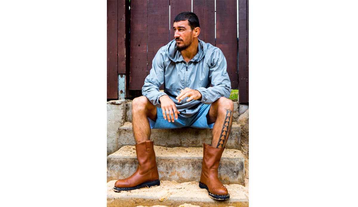 Dustin Barca in between marches against Monsanto and GMOs. Photo: <a href=\"https://davenelson-photography.com\">David Nelson</a>