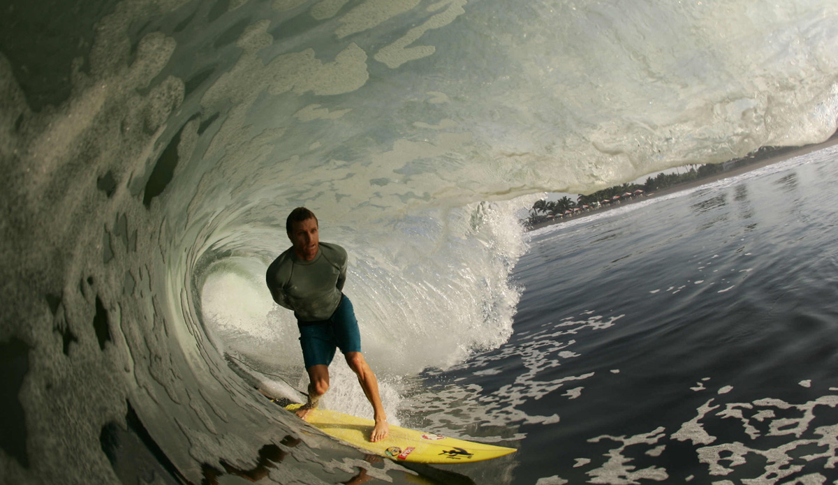 Kyle Thiermann standing straight up in a huge cave in Mexico. Photo: <a href=\"https://davenelson-photography.com\">David Nelson</a>