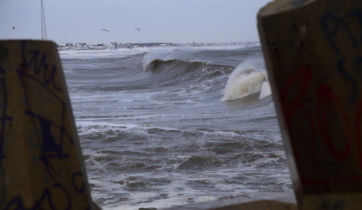 An angry, dirty, and cold post snow-storm swell slams the coast. Photo: <a href=\"https://michaelguccione.smugmug.com/\"> Michael Guccione</a>