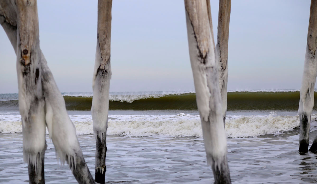 Winter breaks from beneath the frozen pier. Photo: <a href=\"https://michaelguccione.smugmug.com/\"> Michael Guccione</a>