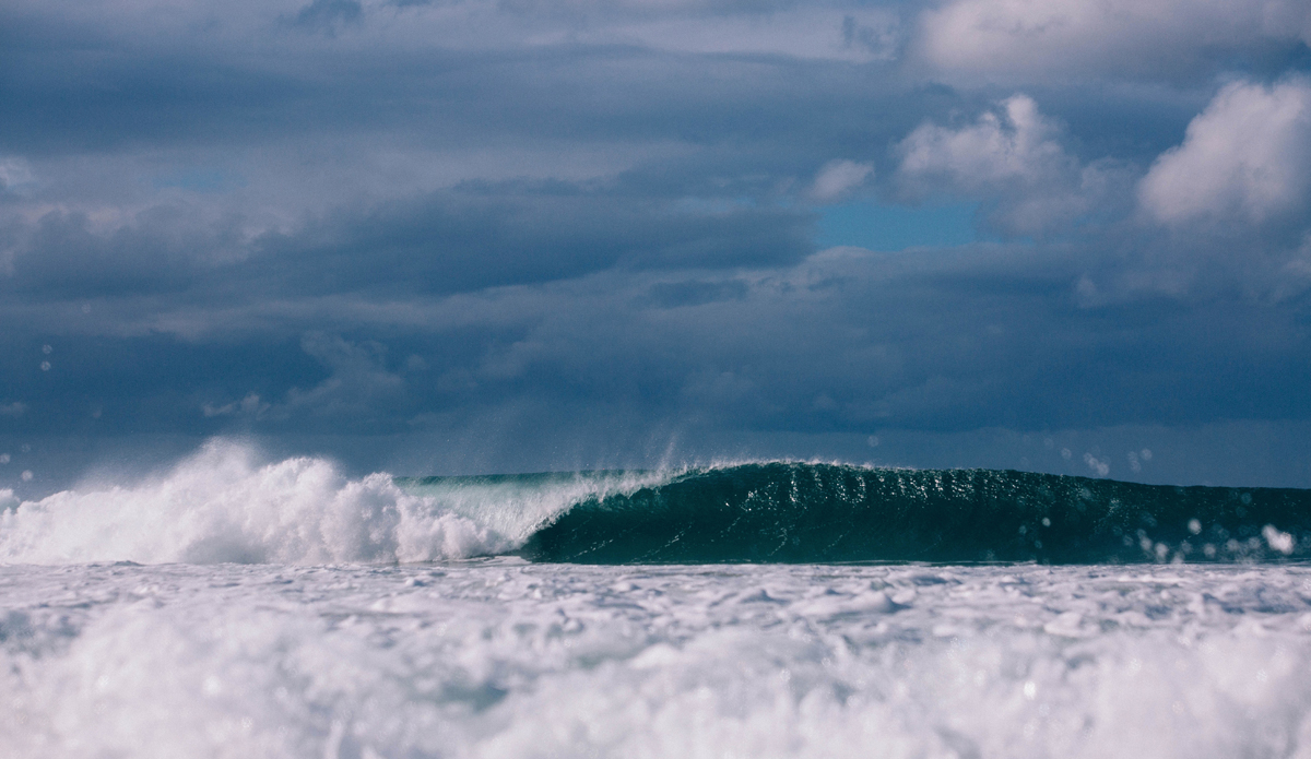 Massive one unloading on the sand. Photo: <a href=\"https://www.jdsmit.co.nz\">Jono Smit</a>