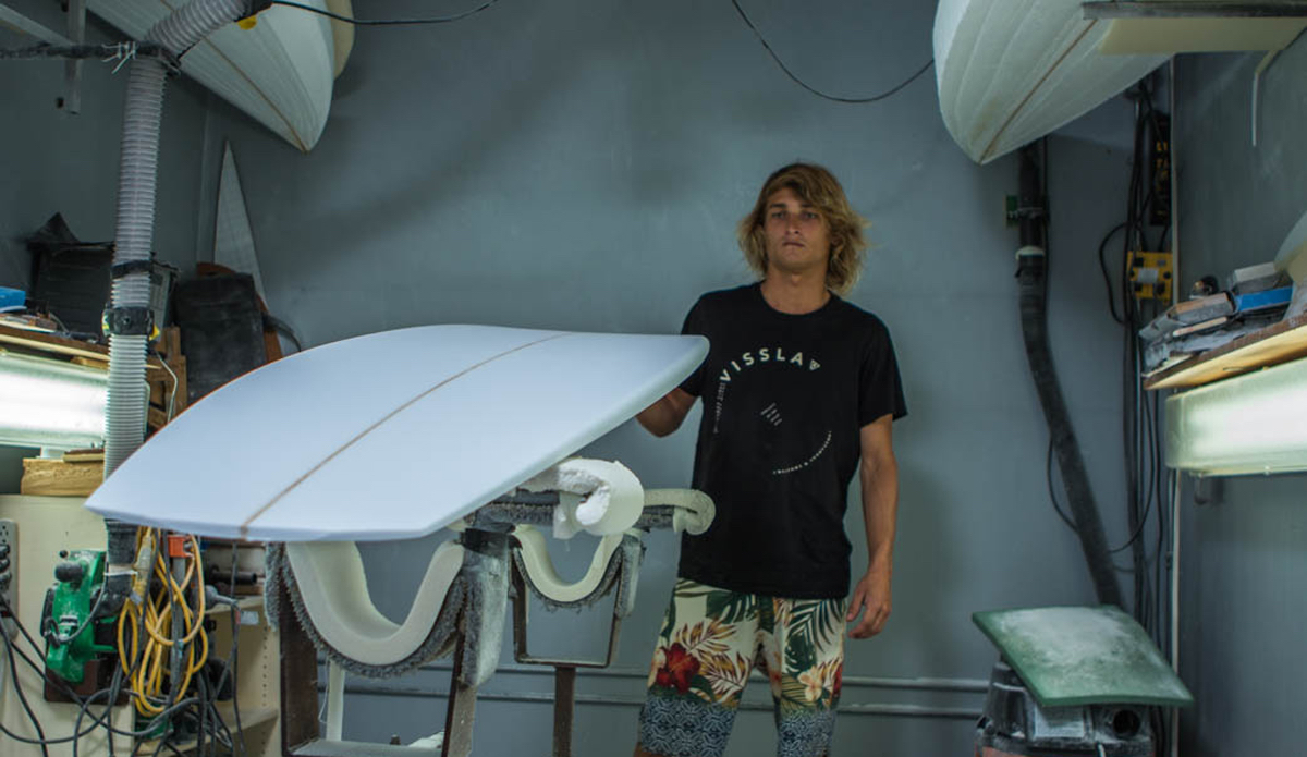 Chaz admiring his work, looking for imperfections and fine tuning the rocker. Photo: <a href=\"https://www.nickricca.com\">Nicks Ricca</a>