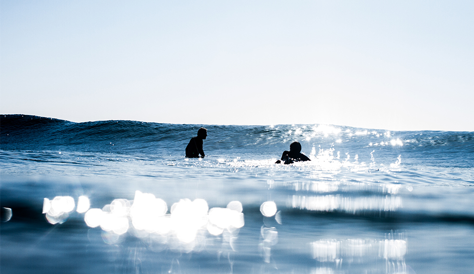 Baynos and Mooch share clear water and glassy waves. Photo: <a href=\"https://www.thetypewriterboy.com/\"> Nico Beighton</a>