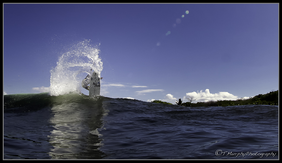Gorkin Cormican drops by on occasion to put the local rippers in their place. This is the fins-free hit to set up the aptly named \"flip.\" Photo: Trevor Murphy