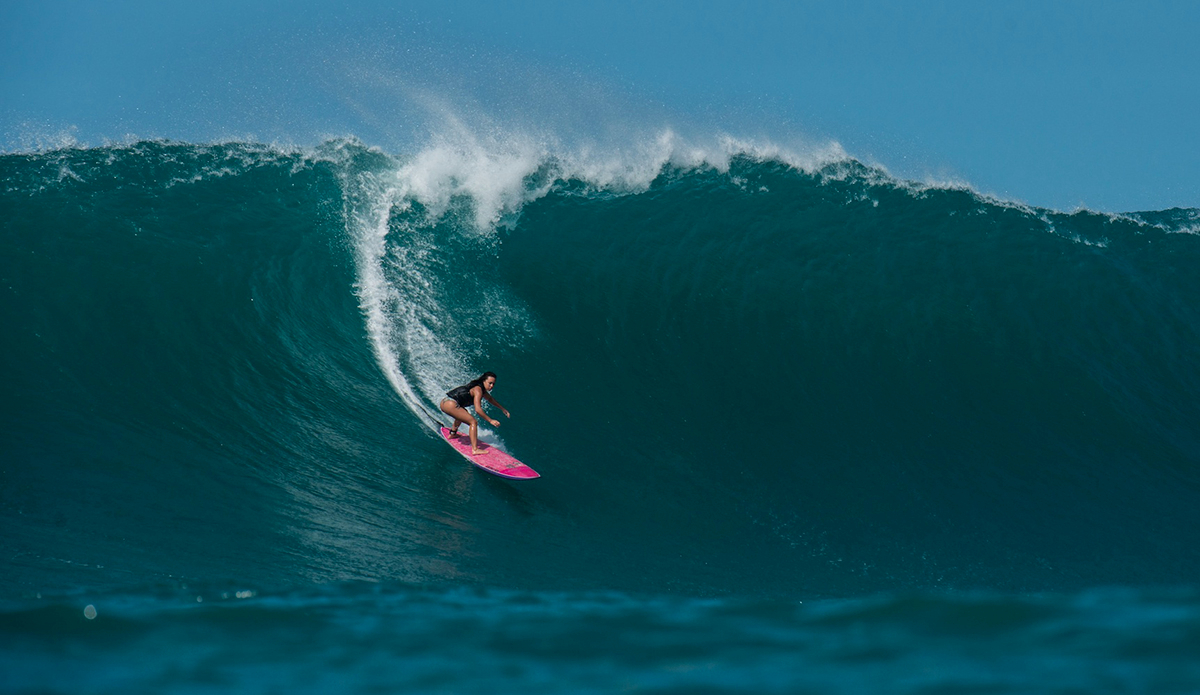 Makani Adric was born and raised in the North Shore of Oahu. She caught her first big wave at Waimea Bay. She was just 16 years old. 
