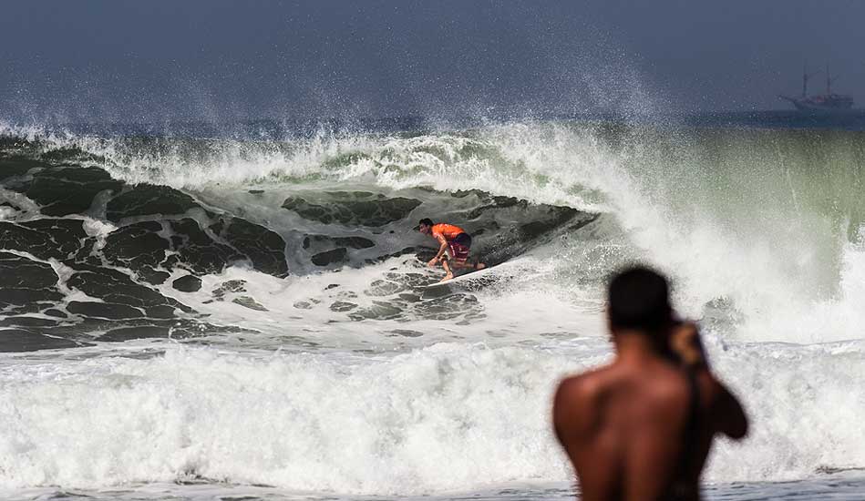 The Champ, Parko, driving through a frothy barrel. Photo: <a href= \"https://www.oakleyprobali.com/photos/\">Mick Curley</a>
