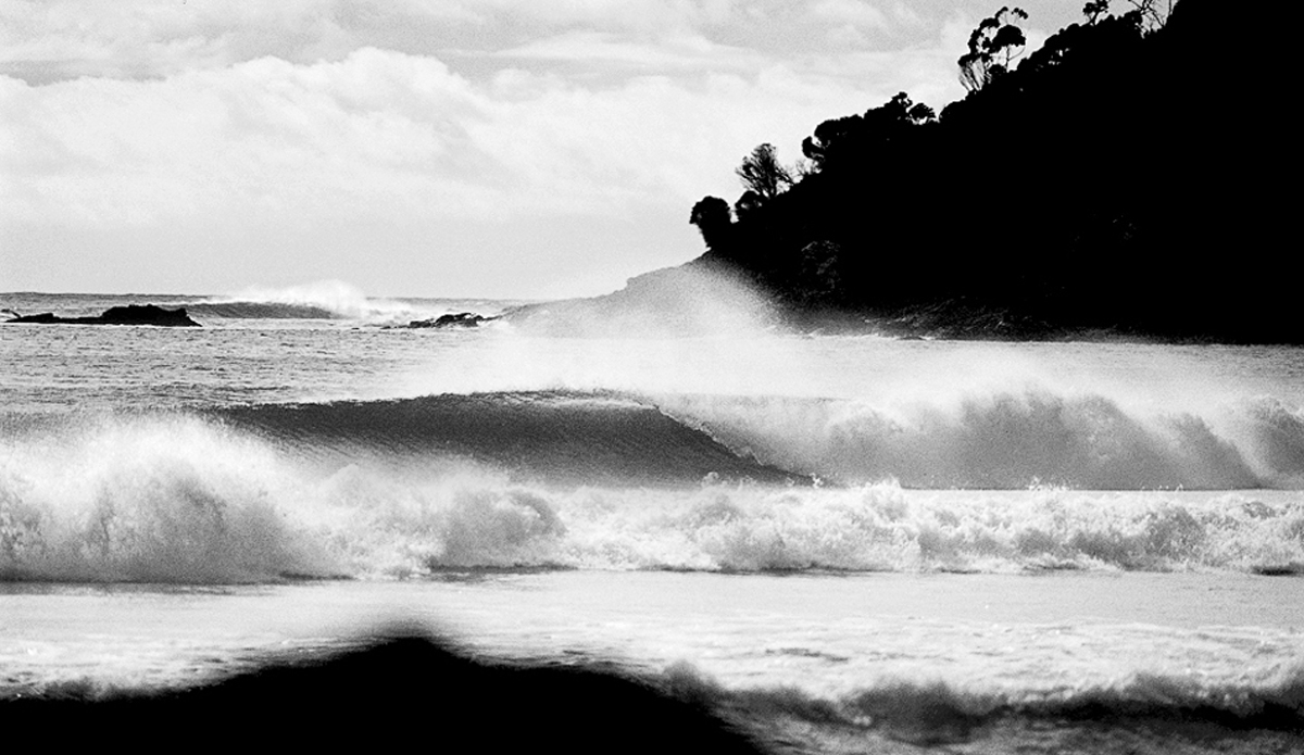 Magical wave and place but I\'m not saying where this is in Australia. I traveled down there in 2002 to get married to my now wife and scored the best right hand barrels of my life. So the story goes something like this... we\'re in Australia when a good friend Gabe Kling tells us of a story of how good things happen to someone right after they step in shit. We\'re all laughing and blow it off. Shortly after hearing this story we literally step in some ( we think human), then arrive at this really fickle spot. The waves were spinning off for 200-300 yards without a drop of water out of place and the locals are saying \"mate you don\'t know how lucky your are, it\'s been flat for months and this is the best it\'s been in years.\" Needless to say we gorged for three straight days. This was snapped on the last day. True story. Photo:<a href=\"https://www.9myles.com/\">Myles McGuinness</a>