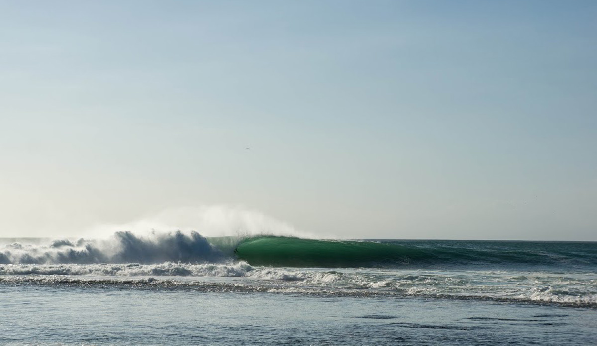 Even after collecting two 8’s early in the heat, Garut would have to battle back to steal the win from Rondi. He did just that, scoring a 9.5 and 9.65 with an uncanny barrel-sense and superb wave selection in the second half of the heat. Photo: <a href=\"https://www.drydenbrown.com/\">Dryden Brown</a>
