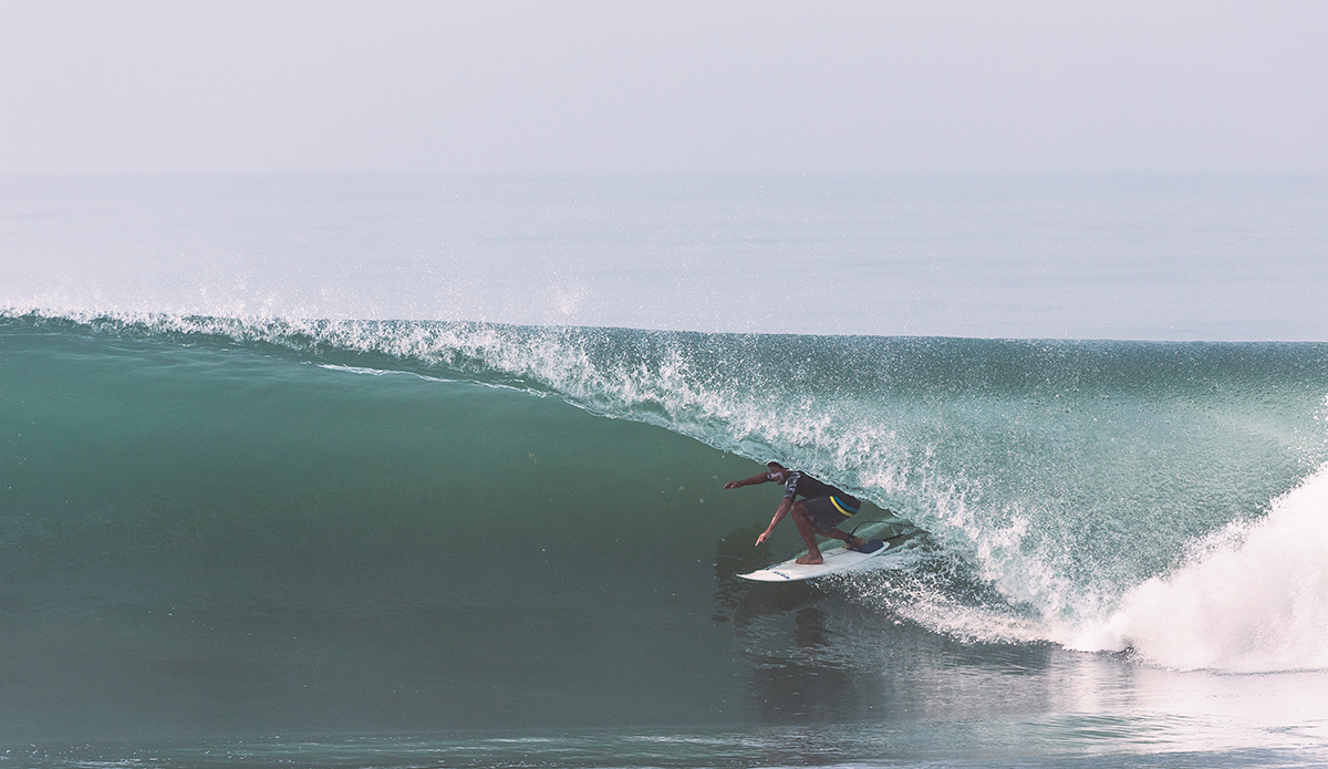 Pacific coast madness. One of the local riders doing what they do best, charging ahead with a smile on their face. Photo: <a href=\"https://www.kheperphoto.com/\">Paola Núñez Linares</a>