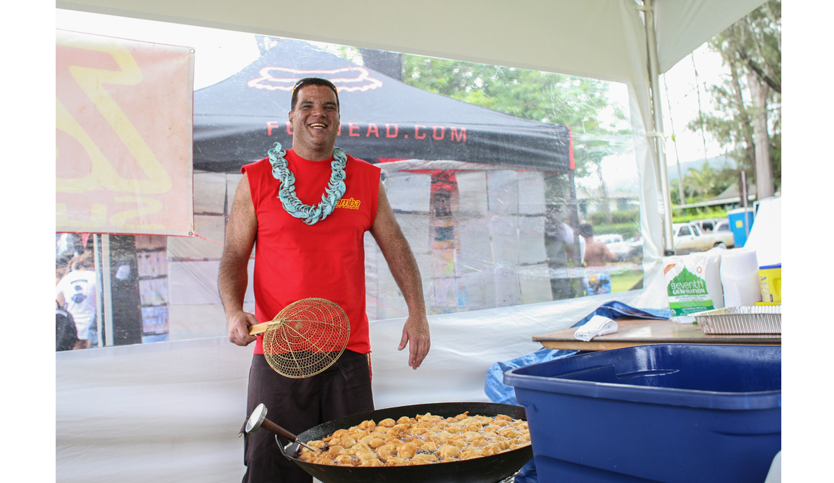 Tamba provided true local spirit and sugar buzz for the event. Here he perfects the art of “Malasadas.” Photo: <a href=\"https://www.danegrady.com/\">Dane Grady</a>