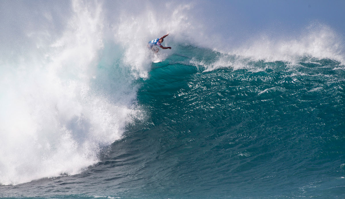 Jadson Andre of Brasil (pictured) winning his Round 2 heat at the Billabong Pipe Masters in Hawaii on Saturday December 13, 2014. Andre posted one of the highest waves of the day, a near perfect 9.37 to advance into Round 3. Photo: <a href=\"https://www.aspworldtour.com/\">ASP</a>/Masurel