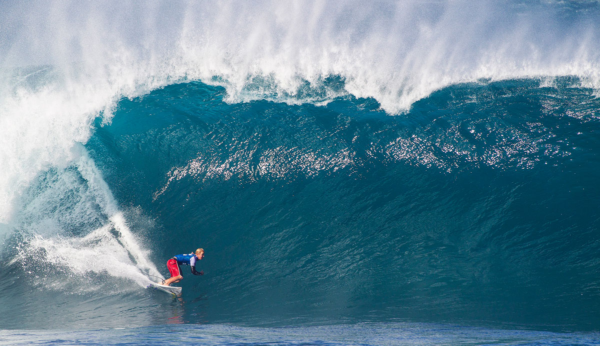 Nat Young of Santa Cruz, California, USA (pictured) winning his Round 2 heat at the Billabong Pipe Masters in Hawaii on Saturday December 13, 2014. Young defeated Mitch Coleborn (AUS) and has advanced into Round 3. Photo: <a href=\"https://www.aspworldtour.com/\">ASP</a>/Masurel