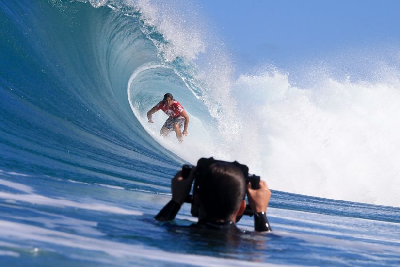 It\'s tough out there for a photographer. Here\'s one of them in the way. Photo: Bielmann