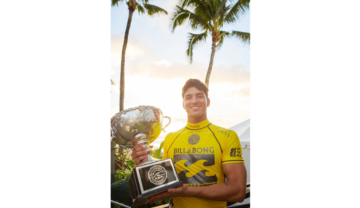 Gabriel Medina of Brasil (pictured) holds his ASP World Title trophy after winning his innuagural ASP World Title when his closest rival Mick Fanning (AUS) was eliminated in Round 5.  Photo: <a href=\"https://www.aspworldtour.com/\">ASP/</a> <a href=\"https://www.kirstinscholtz.com/\">Kirstin Scholtz</a>
