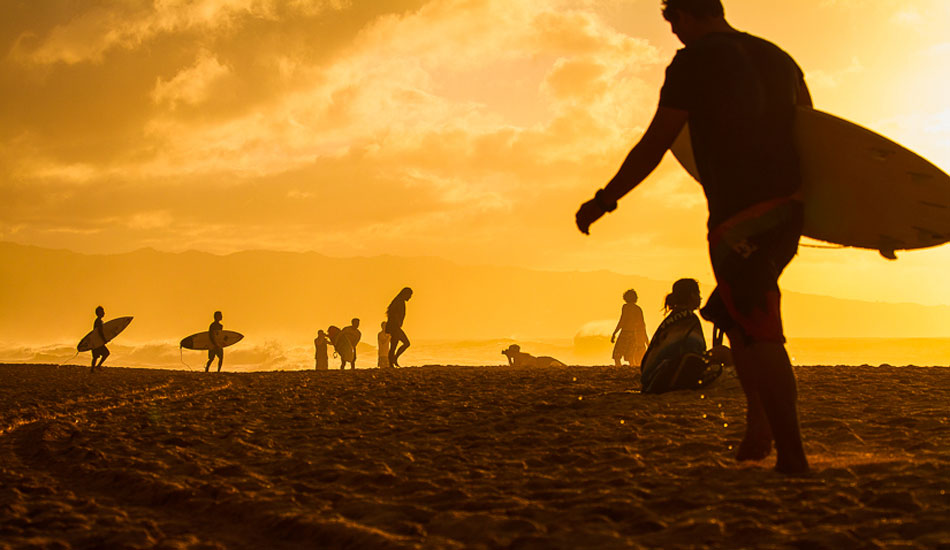 This is a rare moment on the North Shore during sunset. The air was filled with mist and vog and this was one of the first good days of the winter season shortly after most of the best surfers in the world arrived for the triple crown. Photo: <a href=\"https://500px.com/DougFalterPhotography\">Doug Falter</a>