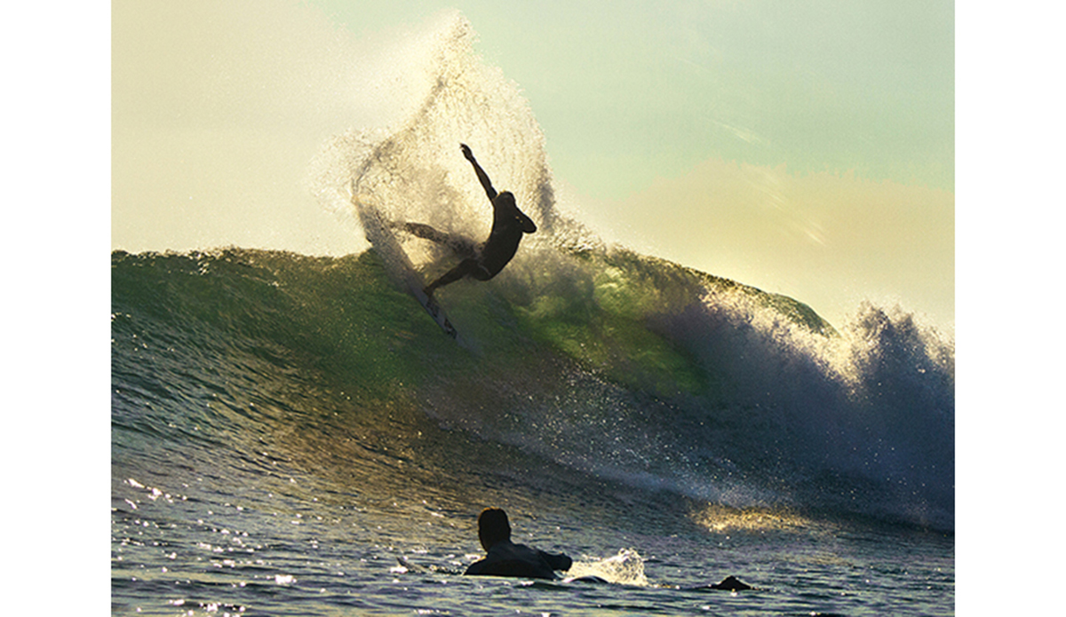 John John Florence busting the top off a Lowers right while Julian Wilson watches from the flats. Photo: <a href=\"https://www.kevinjara.com/\">Kevin Jara</a>
