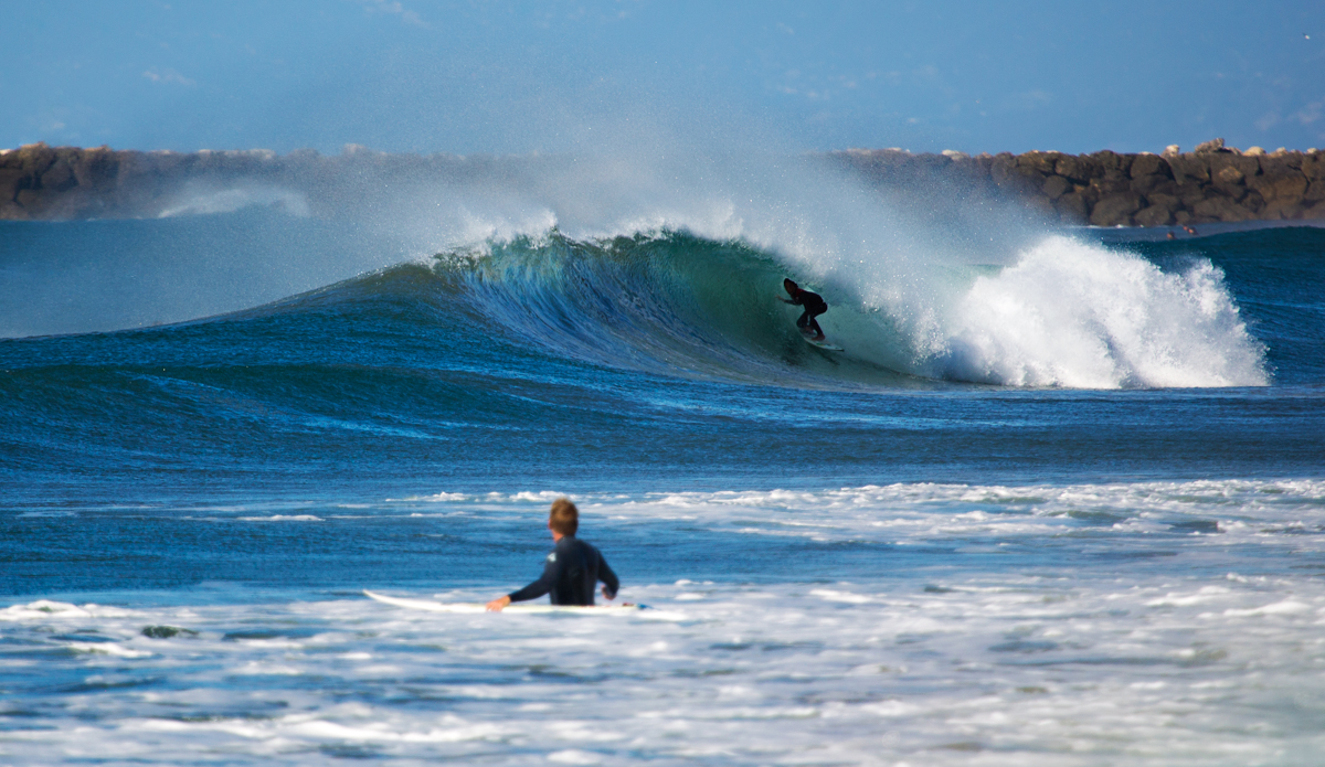 An unknown surfer proving that you’re not deep enough unless you’re riding the foam ball. Photo: <a href=\"https://www.maxxbuchanan.com/\">Maxx Buchanan</a>