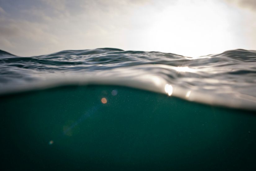 \"Awash.\"  A small day with uncooperative waves led to this study of the ocean\'s surface.  Image: <a href=\"https://www.withinwaves.com/\" target=\"_blank\">Allen</a>