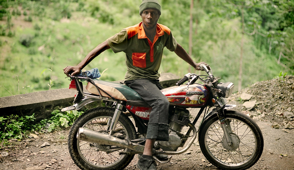 Classic Jamaican dude, this guy was all about style. Look at that motorcycle! Image: <a href=\"https://www.paulferraris.com/\" target=\"_blank\">Ferraris</a>
