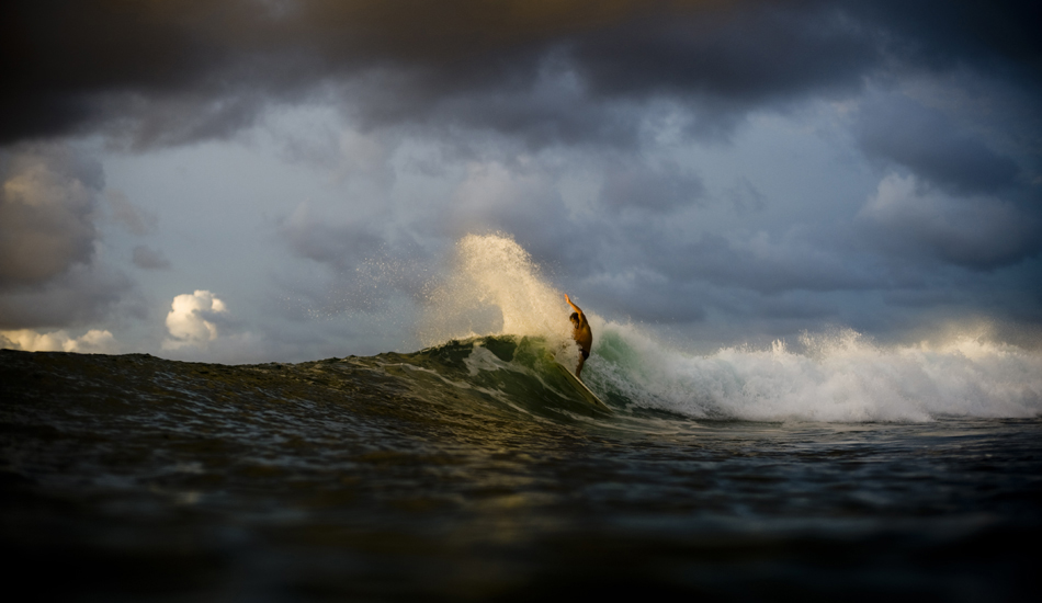 This is my good buddy Eric Knutson from Oahu. One of his friends this day went down on a drainer and tore the skin off everything below this nose. Velzyland, super shallow. Photo: <a href=\"https://www.rickyjlesser.com/\" target=_blank>Ricky Lesser.</a>