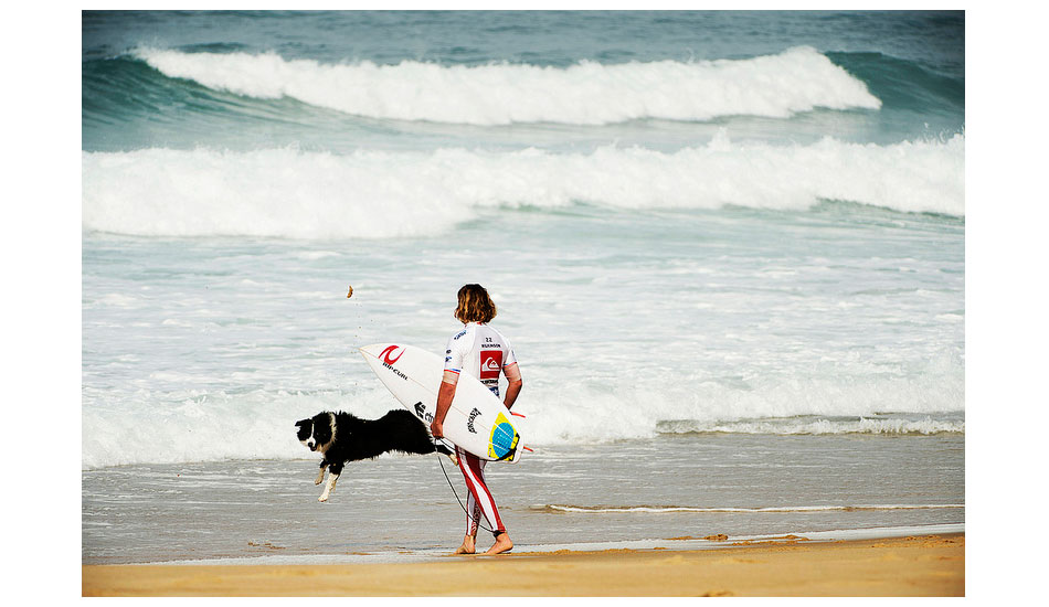 This pup felt the need to do something equally as weird as Wilko\'s new wetsuit. Success. Photo: <a href=\"https://quiksilverlive.com/profrance/2013/\">Quiksilver</a>