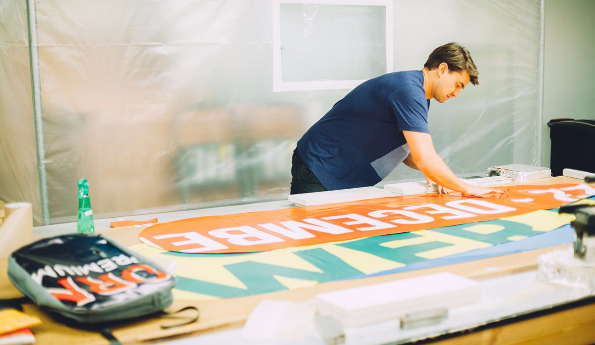 Creating the product from upcycled billboards. 
